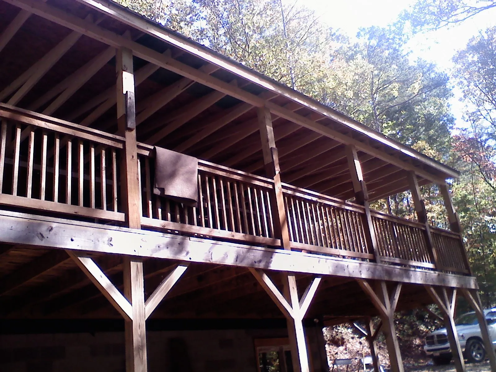Timber framing under a new elevated porch and deck — Roof Leak Repair in Johnstown by Roofing Brothers